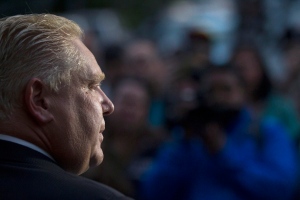 Doug Ford speaks to the media outside his mother's Etobicoke home on Friday, Sept. 12, 2014. (The Canadian Press/Chris Young)