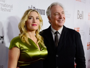 Kate Winslet and Alan Rickman arrive on the red carpet for the film "A Little Chaos " at the Toronto International Film Festival in Toronto on Saturday Sept. 13, 2014. (Frank Gunn /The Canadian Press)