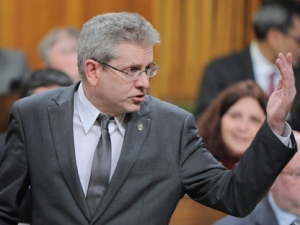 NDP MP Charlie Angus stands during Question Period in the House of Commons on Parliament Hill in Ottawa on Monday, Dec. 12, 2011. THE CANADIAN PRESS/Sean Kilpatrick