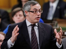 Tony Clement, president of the Treasury Board, stands in the House of Commons during Question Period on Parliament Hill in Ottawa on Monday, Feb. 13, 2012. (THE CANADIAN PRESS/Fred Chartrand)