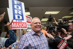 Toronto mayoral candidate Doug Ford greets volunteers in his campaign office before starting his campaign by door knocking in his local Etobicoke neighbourhood of Toronto on Saturday, Sept. 20, 2014. (The Canadian Press/Chris Young)