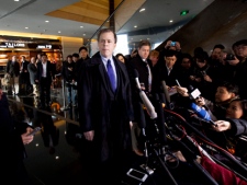 U.S. Special Representative for North Korea Affairs Glyn Davies, centre, arrives to give a press statement at a hotel in Beijing, China, on Wednesday, Feb. 22, 2012, as the U.S. and North Korea reopen nuclear talks. (AP Photo/Andy Wong)