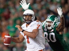 B.C. Lions quarterback Jarious Jackson is tackled by Saskatchewan Roughriders defensive end Brent Hawkins during a CFL game in Regina, Sask., Thursday, Aug. 12, 2010, in Regina, Sask. (THE CANADIAN PRESS/Troy Fleece)