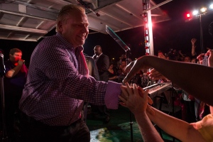 Doug Ford reaches out to supporters after addressing the crowd at Ford Fest in Toronto on Saturday, Sept. 27, 2014. (The Canadian Press/Chris Young)