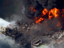 The Deepwater Horizon oil rig is seen burning, in the Gulf of Mexico more than 50 miles southeast of Venice on Louisiana's tip, Wednesday, April 21, 2010. (AP / Gerald Herbert)