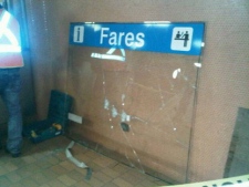 Bullet holes are visible after a failed robbery attempt at Dupont Station on Sunday night.
