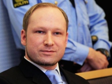 Anders Behring Breivik, a right-wing extremist who confessed to a bombing and mass shooting that killed 77 people on July 22, 2011, arrives for a detention hearing at a court in Oslo, Norway, Monday, Feb. 6, 2012. About 100 survivors and relatives of the victims of the July 22 massacre attended the hearing in Oslo's district court - expected to decide to keep Breivik in jail until his trial begins in April. (AP Photo/Lise Aserud, Scanpix Norway)