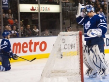 Toronto Maple Leafs goalie James Reimer, right, and Maple Leafs defenceman John-Michael Liles look on after the Florida Panthers scored during first period NHL hockey action in Toronto on Tuesday, Feb. 28, 2012. (THE CANADIAN PRESS/Nathan Denette