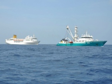 In this photo taken by a member of French fishing vessel The Talenduic and provided by the Prefecture of the Reunion Island, the Italian cruise ship, The Costa Allegra, left, is towed by French fishing vessel The Trevignon in the Indian Ocean on Tuesday, Feb. 28, 2012. (AP Photo/Le Talenduic, Reunion Island Prefecture, HO)