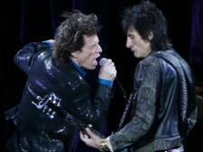 The Rolling Stones perform during their "A Bigger Bang" tour in Warsaw, Poland, Wednesday, July 25, 2007. (AP Photo/Czarek Sokolowski)