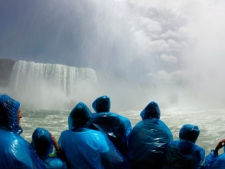 In this June 11, 2010 file photo, tourists ride the Maid of the Mist boat at the base of the Horseshoe Falls in Niagara Falls, N.Y. (AP Photo/David Duprey)
