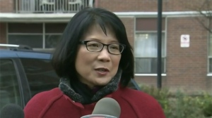 Mayoral candidate Olivia Chow makes a campaign announcement outside a private rental building Monday October 20, 2014. 