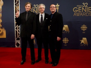 Viggo Mortensen (left), David Cronenberg and Martin Katz (right), from the movie "A Dangerous Method' arrive on the red carpet at the 32nd Genie Awards in Toronto on Thursday, March 8, 2012. (THE CANADIAN PRESS/Chris Young.)