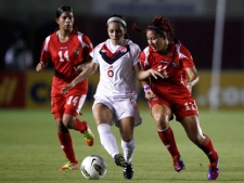 Canada's Jaclyn Sawicki, center, fight for the ball against Panama's Yessenia Zorrilla, left, and Yvamara Rodriguez, right, during a Concacaf women�s under 20 semifinal soccer match in Panama City on Friday, March 9, 2012. (AP Photo/Arnulfo Franco)