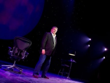 In this theater image released by Boneau/Bryan-Brown, William Shatner performs in his one-man show, "Shatner's World: We Just Live In It," at Broadway's Music Box Theatre in New York. (AP Photo/Boneau/Bryan-Brown, Joan Marcus)