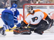 Philadelphia Flyers goaltender Ilya Bryzgalov (right) saves Toronto Maple Leafs Tyler Bozak's shot during a shoot out in NHL hockey action in Toronto on Saturday March 10, 2012.THE CANADIAN PRESS/Chris Young