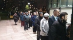 About 200 people are lined up outside the polling station in Regent Park at 620 Dundas St. (Ken Regular/ CTV News) 