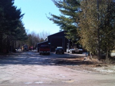 An OPP cruiser and a fire truck are pictured at the scene of an industrial accident on Anderson Line on Severn Township on Wednesday, March 14, 2012. (CTV/Justin Rydell)