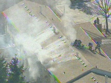 Emergency crews are seen battling a residential fire in Richmond Hill. (CP24)