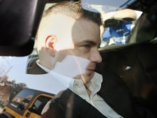 Michael Rafferty is transported in the back of a police cruiser from the courthouse  in London, Ont., Wednesday, March, 14, 2012. Rafferty is on trial in the death of Victoria (Tori) Stafford. (THE CANADIAN PRESS/Dave Chidley)