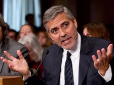 Actor George Clooney testifies on Capitol Hill in Washington, Wednesday, March 14, 2012, before the Senate Foreign Relations Committee hearing on Sudan.  (AP Photo/Manuel Balce Ceneta)