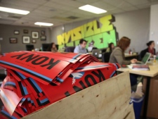 A box full to the brim with KONY 2012 campaign posters are shown on Thursday, March 8, 2012 at the Invisible Children Movement offices in San Diego. (AP Photo/John Mone)