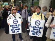 Striking public library workers are shown outside the Toronto Reference Library Monday morning. (CP24)