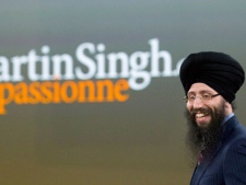 NDP leadership candidate Martin Singh walks on stage during the NDP leadership convention in Toronto on Friday, March 23, 2012. (THE CANADIAN PRESS/Frank Gunn)