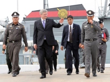 Prime Minister Stephen Harper is given a tour by the Royal Thai Police marine division in Bangkok, Thailand on Saturday, March 24, 2012. THE CANADIAN PRESS/Sean Kilpatrick