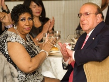 Aretha Franklin and Clive Davis attend her seventieth birthday party in New York, Saturday, March 24, 2012. (AP Photo/Charles Sykes)