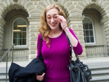 Valerie Scott, legal co-ordinator for Sex Professionals of Canada (SPOC), leaves the Ontario Appeals Court in Toronto, Monday, June 13, 2011.The federal and Ontario governments are appealing a ruling that struck down three laws affecting the practice of prostitution.THE CANADIAN PRESS/Nathan Denette