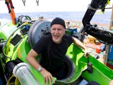Filmmaker and National Geographic Explorer-in-Residence James Cameron emerges from the Deepsea Challenger submersible after his successful solo dive to the Mariana Trench, the deepest part of the ocean, Monday, March 26, 2011. (AP Photo/Mark Theissen, National Geographic)