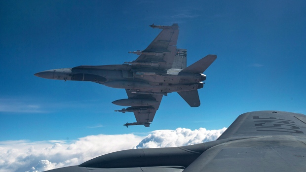 A Royal Canadian Air Force CF-18 Hornet breaks awa