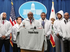 State Sen. Rod Wright, D-Inglewood, center, talks of the shooting of Trayvon Martin during a news conference at the Capitol in Sacramento, Calif., Thursday, March 29, 2012. More than a dozen Senators and Assembly members wore hooded sweat shirts on the floor of each chamber and ended the day's session in memory of the 17-year-old who was shot to death Feb. 26 by a neighborhood watch volunteer in a gated community in Sanford, Fla. (AP Photo/Rich Pedroncelli)
