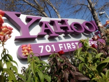 In this Jan. 4, 2012, file photo, the company logo is displayed at Yahoo headquarters in Sunnyvale, Calif. (AP Photo/Paul Sakuma, File)