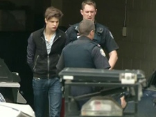 Oliver Karafa, 19, leaves a Toronto court on Tuesday, April 3, 2012. (CTV)