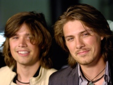 Taylor Hanson, right, and his brother Zac of the rock band Hanson pose together before a preview screening of the documentary film "Darfur Now" at the Directors Guild of America in Los Angeles, Tuesday, Oct. 30, 2007. (AP Photo/Chris Pizzello)