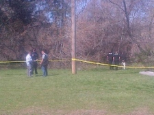 Police tape is shown where a body was discovered in Burlington Saturday. (Dave Ritchie)