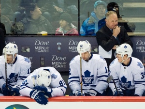 Toronto Maple Leafs head coach Randy Carlyle looks on from the bench during second period NHL hockey action against the Montreal Canadiens in Montreal, Saturday, April 7, 2012. THE CANADIAN PRESS/Graham Hughes