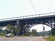 The Bloor Viaduct, and the barriers along it, are seen from the Don Valley Parkway.