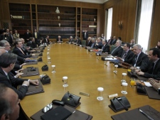 Members of the Greek Government attend a cabinet meeting at the Parliament in Athens, Wednesday, April 11, 2012. (AP Photo/Thanassis Stavrakis)