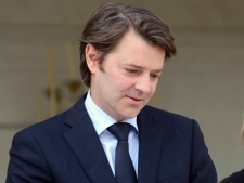 French Finance Minister Francois Baroin leaves at the end of a weekly cabinet meeting at the Elysee palace in Paris, Wednesday, April 22, 2012. (AP Photo/Jacques Brinon)