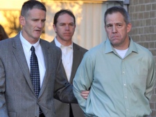 In this April 2, 2012, file photo JetBlue pilot Clayton Frederick Osbon, right, is escorted to a waiting vehicle by FBI agents as he is released from The Pavilion at Northwest Texas Hospital, in Amarillo, Texas. Osbon, who disrupted a Las Vegas-bound flight after leaving the cockpit, was indicted on one count of interfering with a flight crew according to court documents posted online on Thursday, April 12, 2012. (AP Photo/Amarillo Globe-News, Michael Schumacher) 