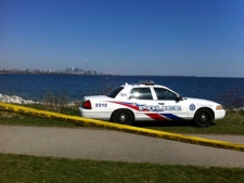 A police car is scene in this picture after a woman was pulled from Lake Ontario on Friday, April 13, 2012. 