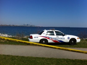 A police car is scene in this picture after a woman was pulled from Lake Ontario on Friday, April 13, 2012. 