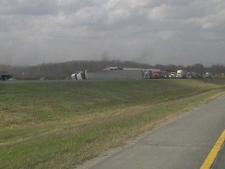 An overturned tractor-trailer on Highway 400 is shown. Heavy winds have led to all southbound lanes on the highway being closed between Highway 88 and Highway 9. (Sue Sgambati/CP24.com) 