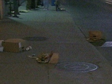 Debris blown by heavy winds near Yonge-Dundas Square Monday evening is shown. (CP24)