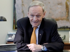 Former prime minister Jean Chretien gestures during an interview at his office in Ottawa, Monday, April 16, 2012. (THE CANADIAN PRESS/Fred Chartrand)