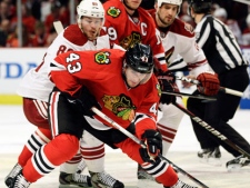 Chicago Blackhawks' Brandon Saad (43) controls the puck against Phoenix Coyotes' Mikkel Boedker (89) during the first period of Game 4 of an NHL hockey Stanley Cup first-round playoff series in Chicago on Thursday, April 19, 2012. (AP Photo/Nam Y. Huh)