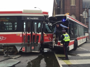Four injured after TTC bus, streetcar collide
